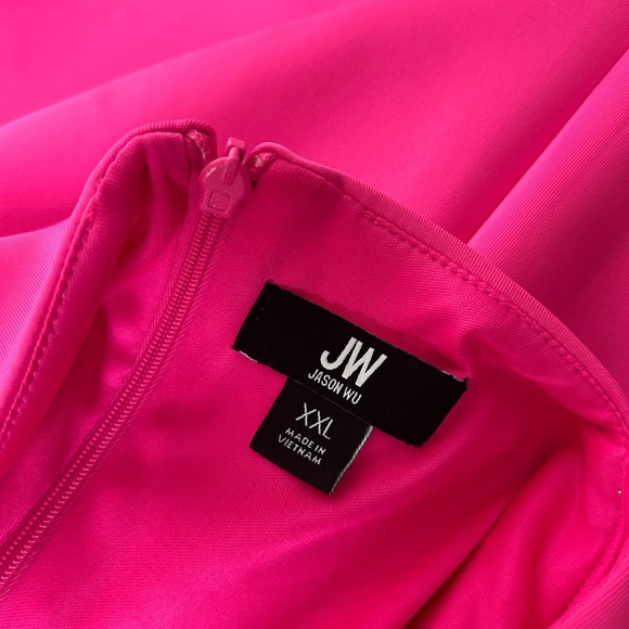 Formal cocktail dress with 3 floral appliqués in front. - Picture 11 of 13